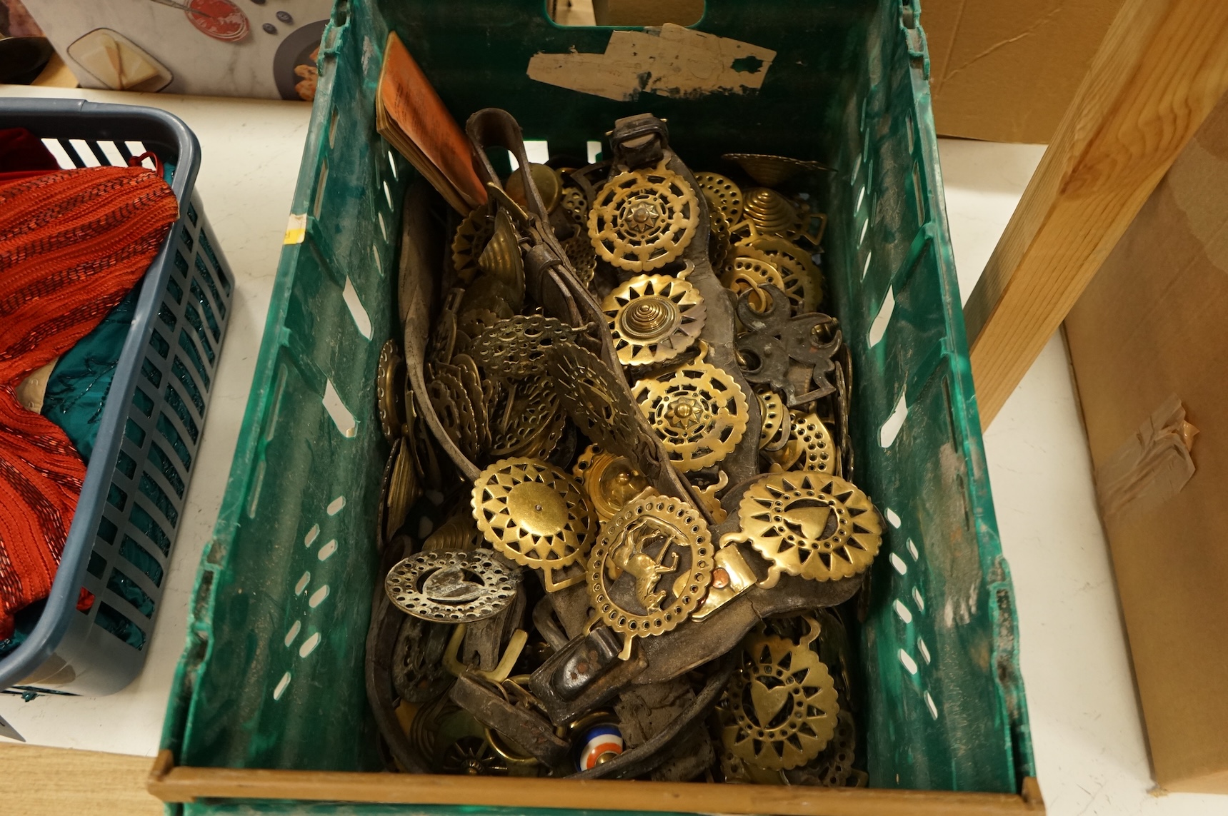 A collection of various horse brasses